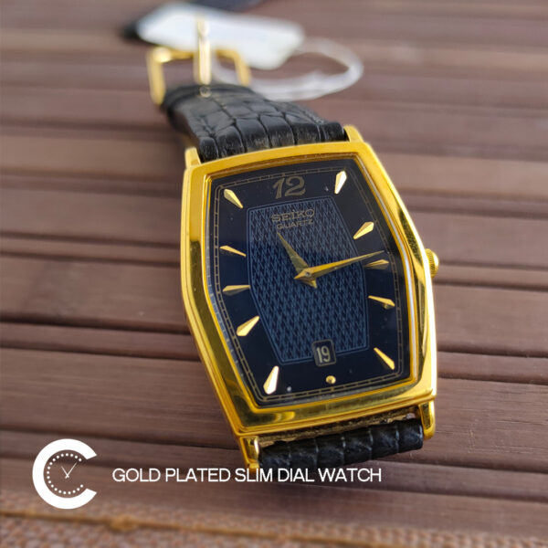 Seiko gents gold plated watch close up