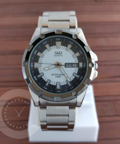 q&q A150J401Y model gents analog wrist watch with date feature