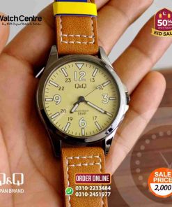 q&q by citizen japan QB12J515Y model youth camel leather and light yellow dial dress watch