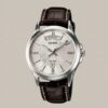 Casio men's silver dial watch with brown leather strap, day and date display, and 50M water resistance
