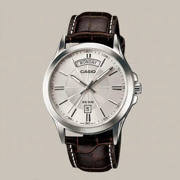 Casio men's silver dial watch with brown leather strap, day and date display, and 50M water resistance
