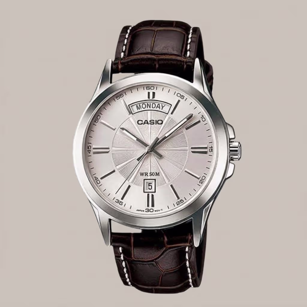 Casio men's silver dial watch with brown leather strap, day and date display, and 50M water resistance
