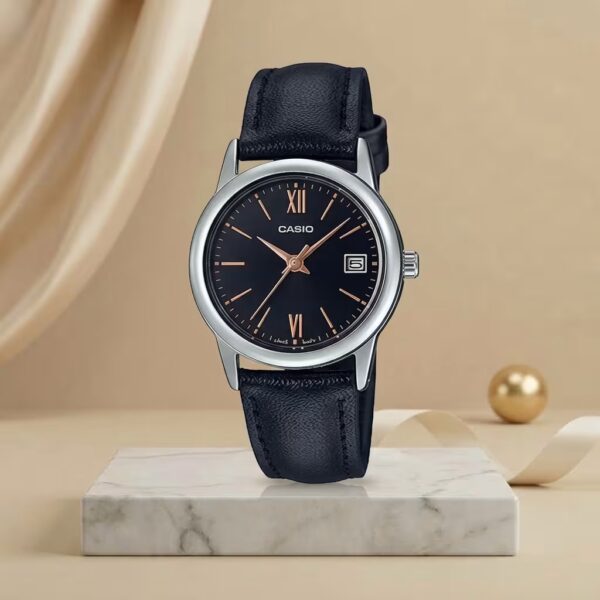 Casio ladies black dial watch with rose-gold markers, silver-tone case, date display and black leather strap