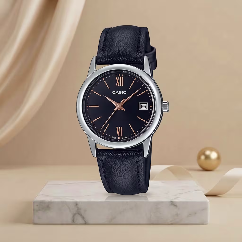 Casio ladies black dial watch with rose-gold markers, silver-tone case, date display and black leather strap