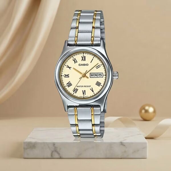 Casio ladies champagne Roman numeral dial watch with silver and gold two-tone stainless-steel bracelet and day-date display