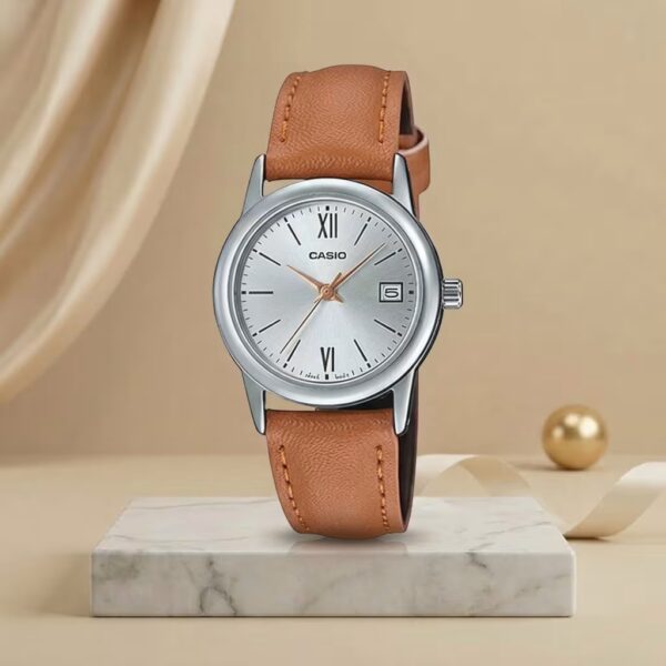 Casio ladies silver dial watch with tan leather strap, silver-tone case and date display