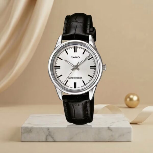 Casio ladies white dial watch with silver-tone case, black leather strap and classic hour markers