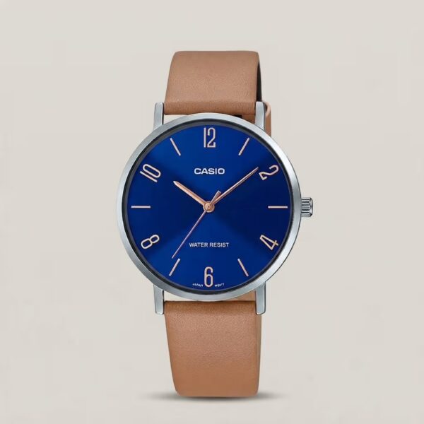 Casio men's blue dial watch with tan leather strap, silver-tone case and rose-gold hands and hour markers