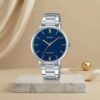 Casio ladies blue dial watch with silver stainless-steel bracelet and rose-gold hands and markers