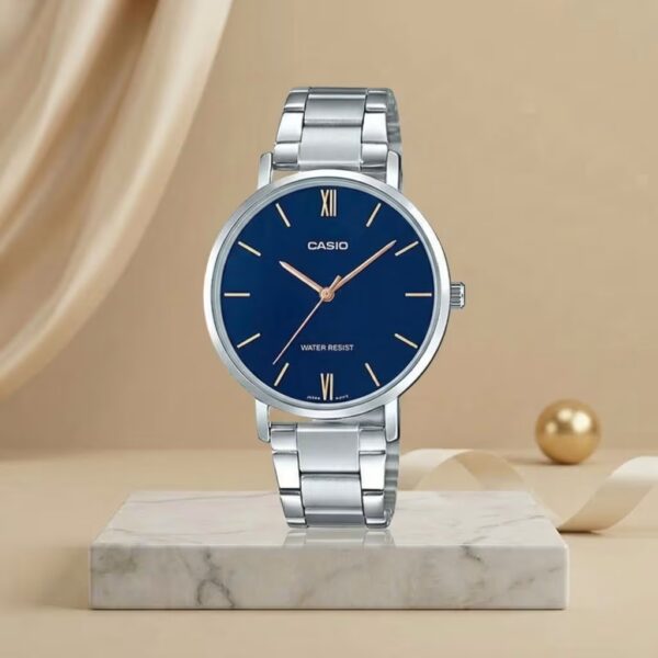 Casio ladies blue dial watch with silver stainless-steel bracelet and rose-gold hands and markers