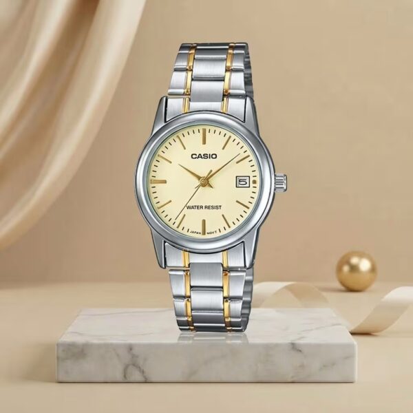 Casio ladies champagne dial watch with silver and gold two-tone stainless-steel bracelet and date display