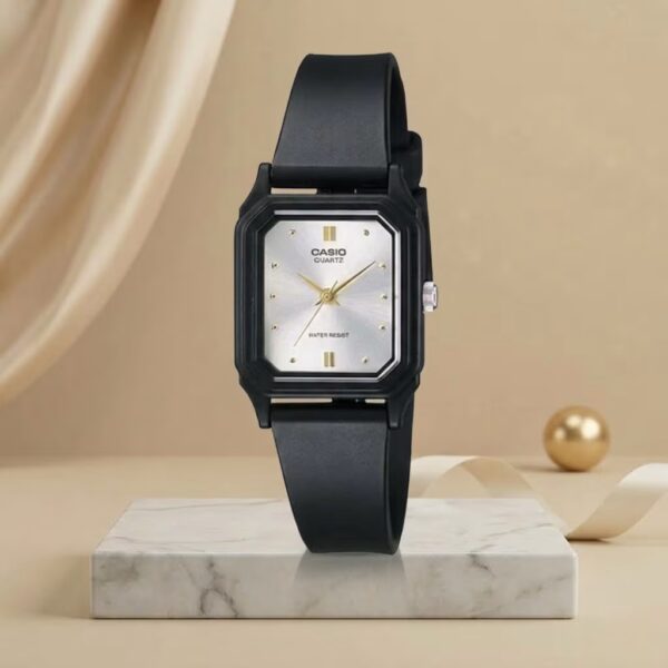 Casio ladies rectangular silver dial watch with black resin strap and gold-tone hands and markers