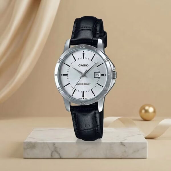 Casio ladies silver dial watch with silver-tone case, black leather strap and date display