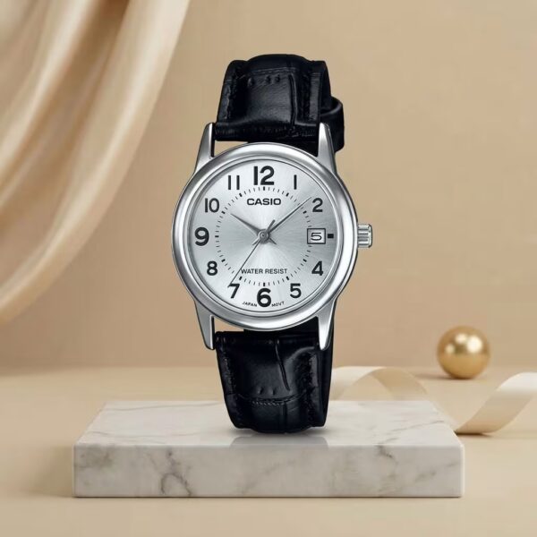Casio ladies silver dial watch with black leather strap, silver-tone case and date display