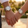 Original Casio Silver Stainless Steel Couple Watches showcased on couple wrists
