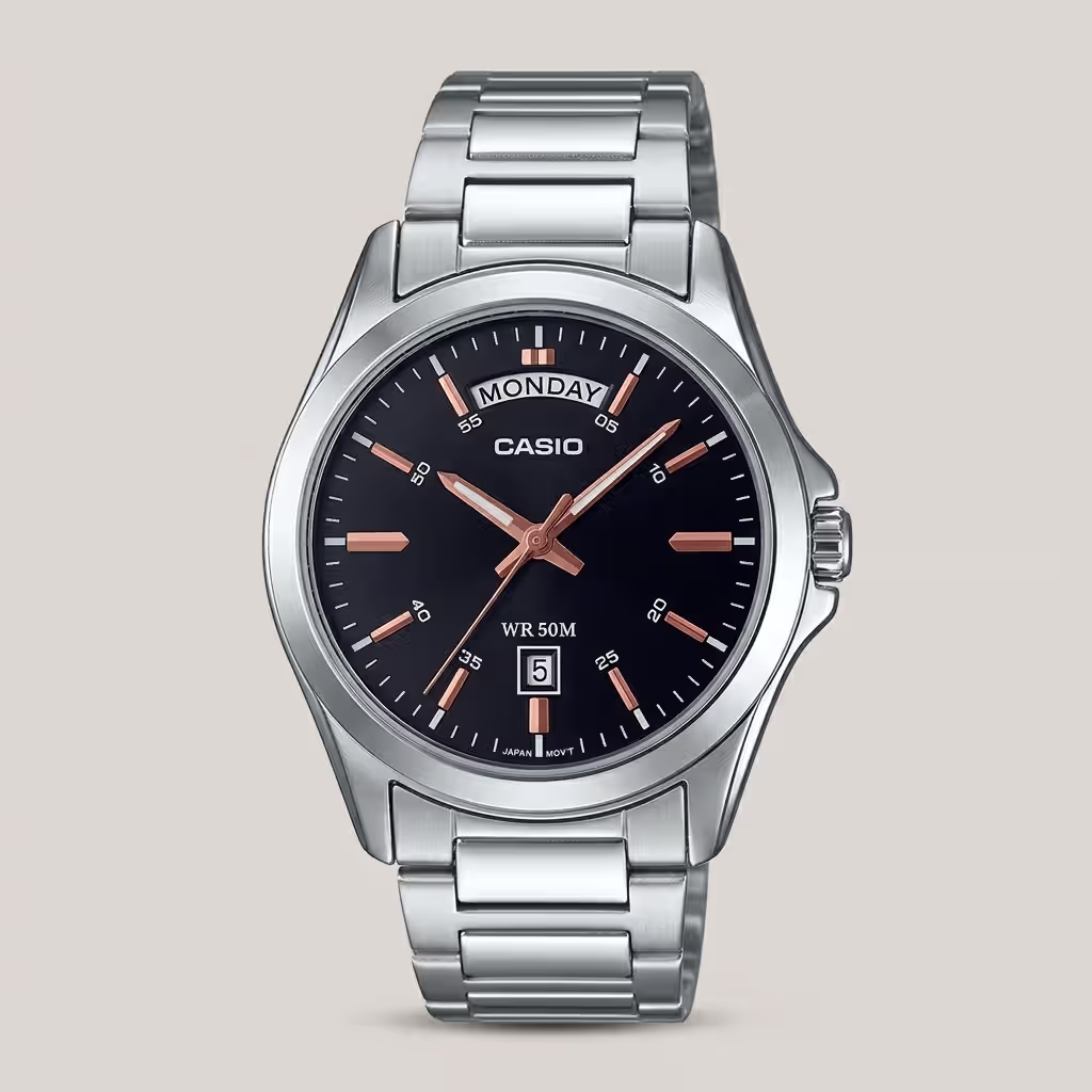Casio MTP-1370D-1A2 stainless steel watch with black dial, rose gold accents, wide day-date window, and 50-meter water resistance.