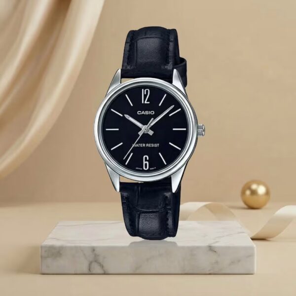 Casio ladies black dial watch with silver-tone case, black leather strap and minimalist 12 and 6 hour markers