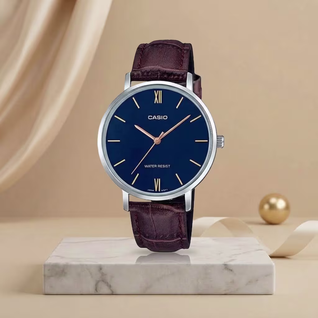 Casio ladies blue dial watch with silver-tone case, rose-gold markers and brown leather strap