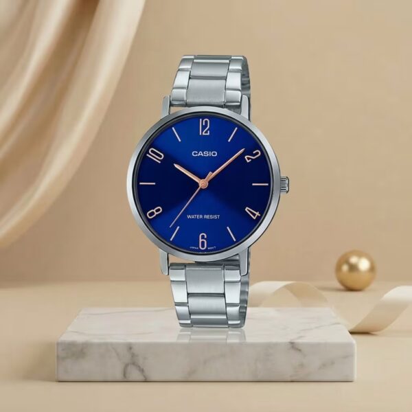 Casio ladies blue dial watch with silver stainless-steel bracelet and rose-gold hands and hour markers