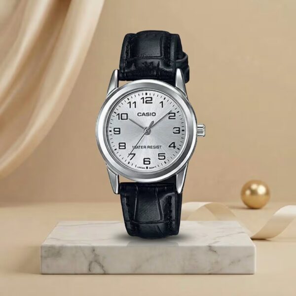 Casio ladies silver dial watch with silver-tone case and black leather strap