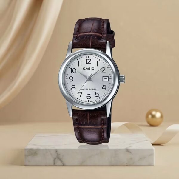 Casio ladies silver dial watch with brown leather strap, silver-tone case and date display
