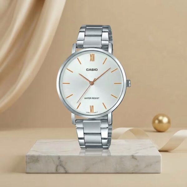 Casio ladies white dial watch with silver stainless-steel bracelet and rose-gold hands and hour markers