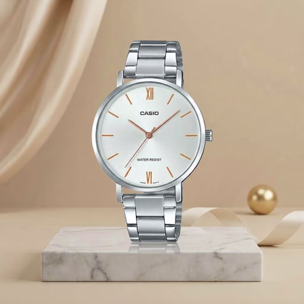 Casio ladies white dial watch with silver stainless-steel bracelet and rose-gold hands and hour markers