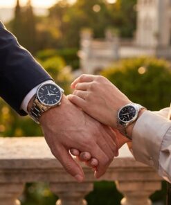 Couple holding Casio gift watches. Male wearing MTP 1303D 1AV and female wearing LTP 1303D 1AV