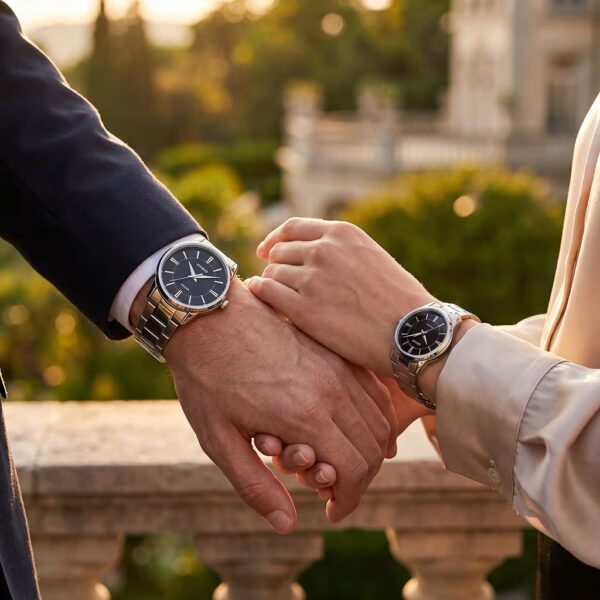 Couple holding Casio gift watches. Male wearing MTP 1303D 1AV and female wearing LTP 1303D 1AV