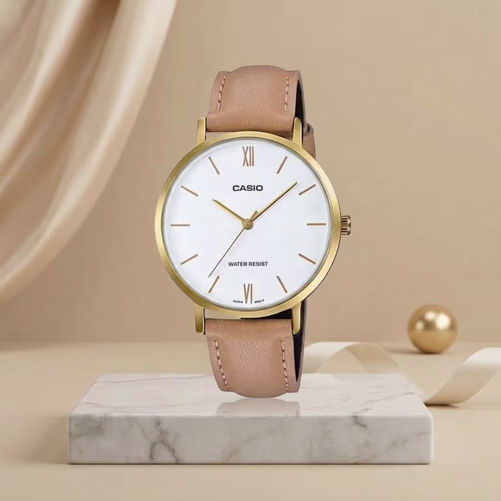 Casio ladies white dial watch with gold-tone case, beige leather strap and minimalist analog design