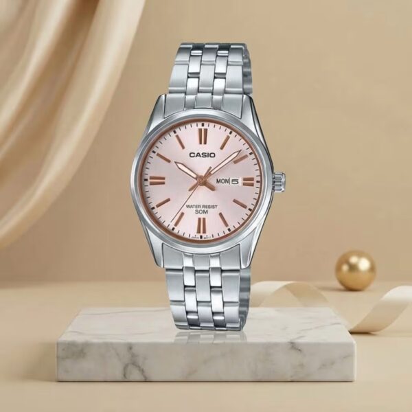 Casio LTP-1335D-4A ladies pink dial watch with silver stainless-steel bracelet and day-date display