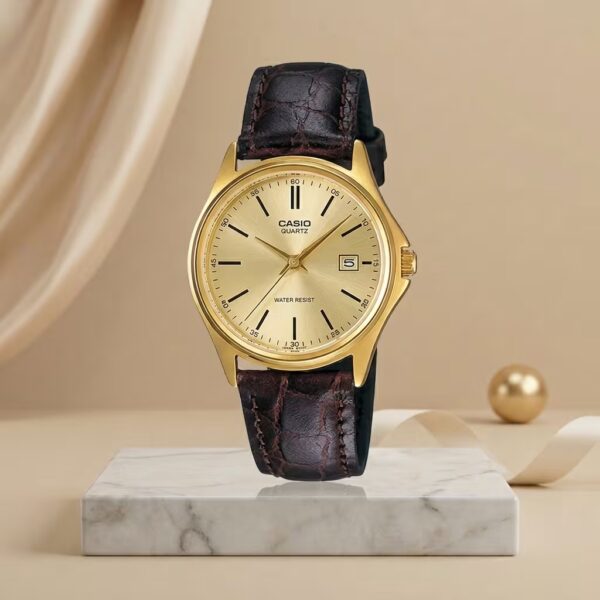 Casio ladies gold dial watch with brown leather strap and date display