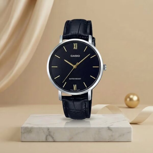 Casio ladies black dial watch with black leather strap, silver-tone case and gold-tone hands and hour markers