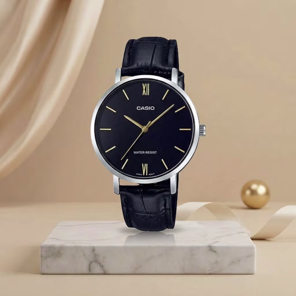 Casio ladies black dial watch with black leather strap, silver-tone case and gold-tone hands and hour markers