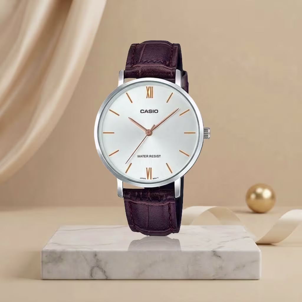 Casio ladies white dial watch with rose-gold markers, silver-tone case and brown leather strap
