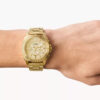 Fossil men's golden gift watch on hand view