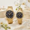 Casio couple watches with black dials and golden stainless-steel bands