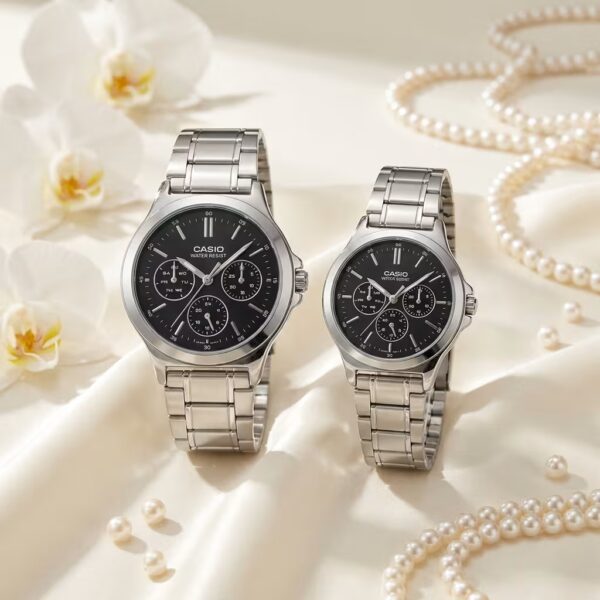 Casio couple watches with black multi-dial faces and silver stainless-steel bands