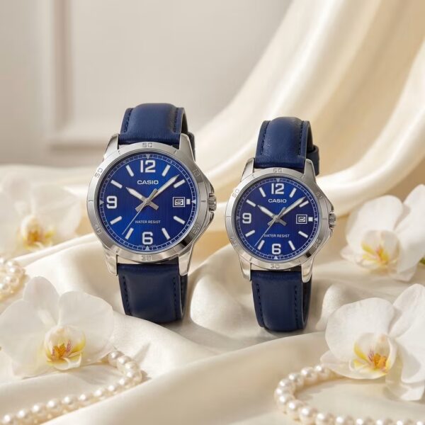 Casio couple watches with blue analog dials and matching blue leather straps