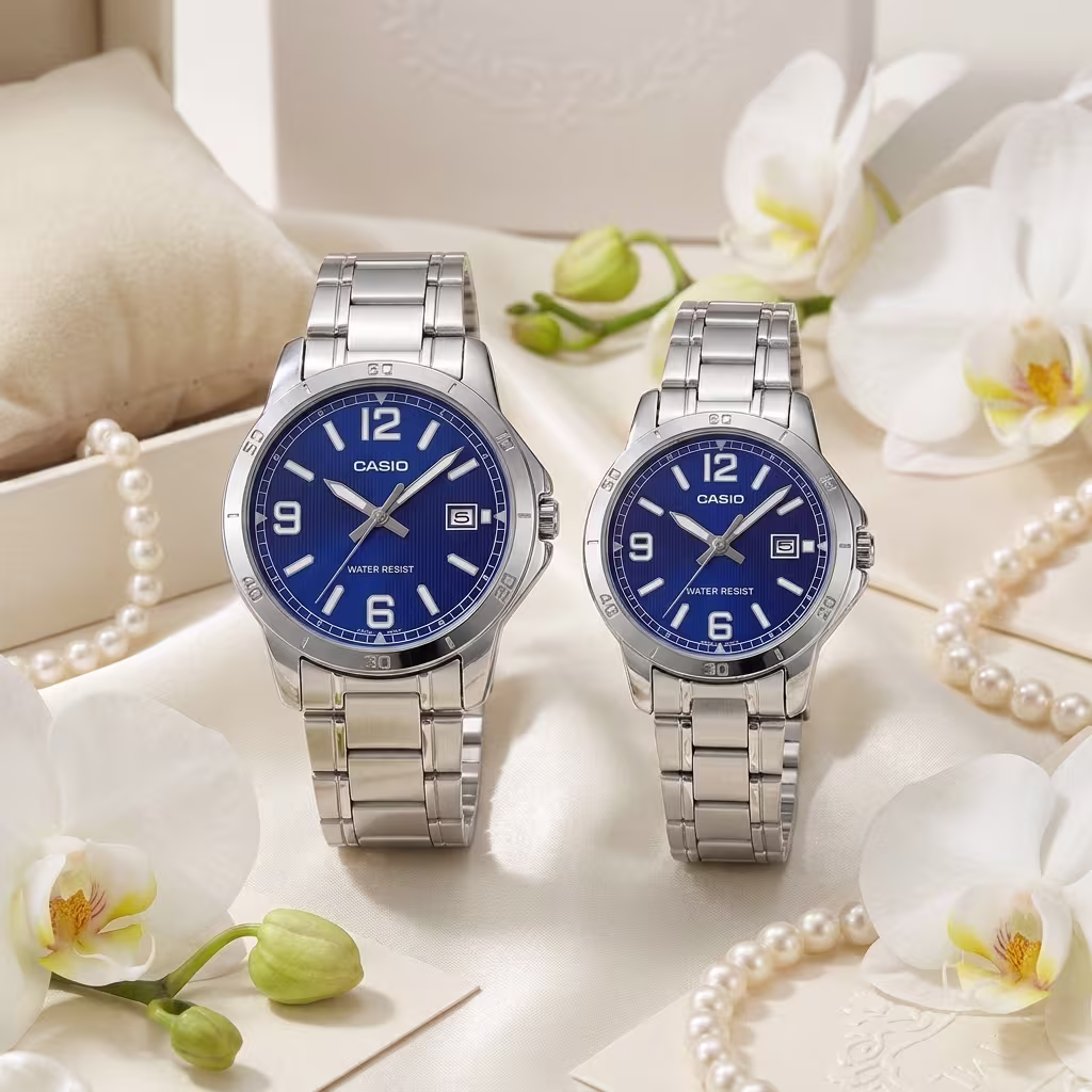 Casio couple watches with blue sporty dials and silver stainless-steel bands