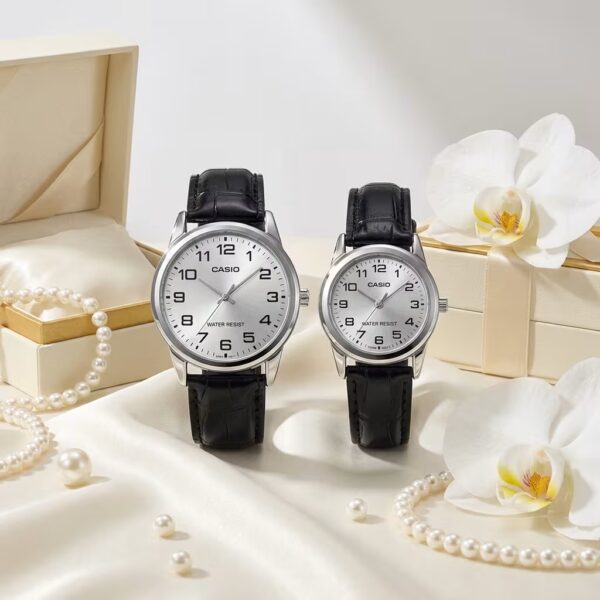 Casio couple watches with silver numeric dials and black leather straps