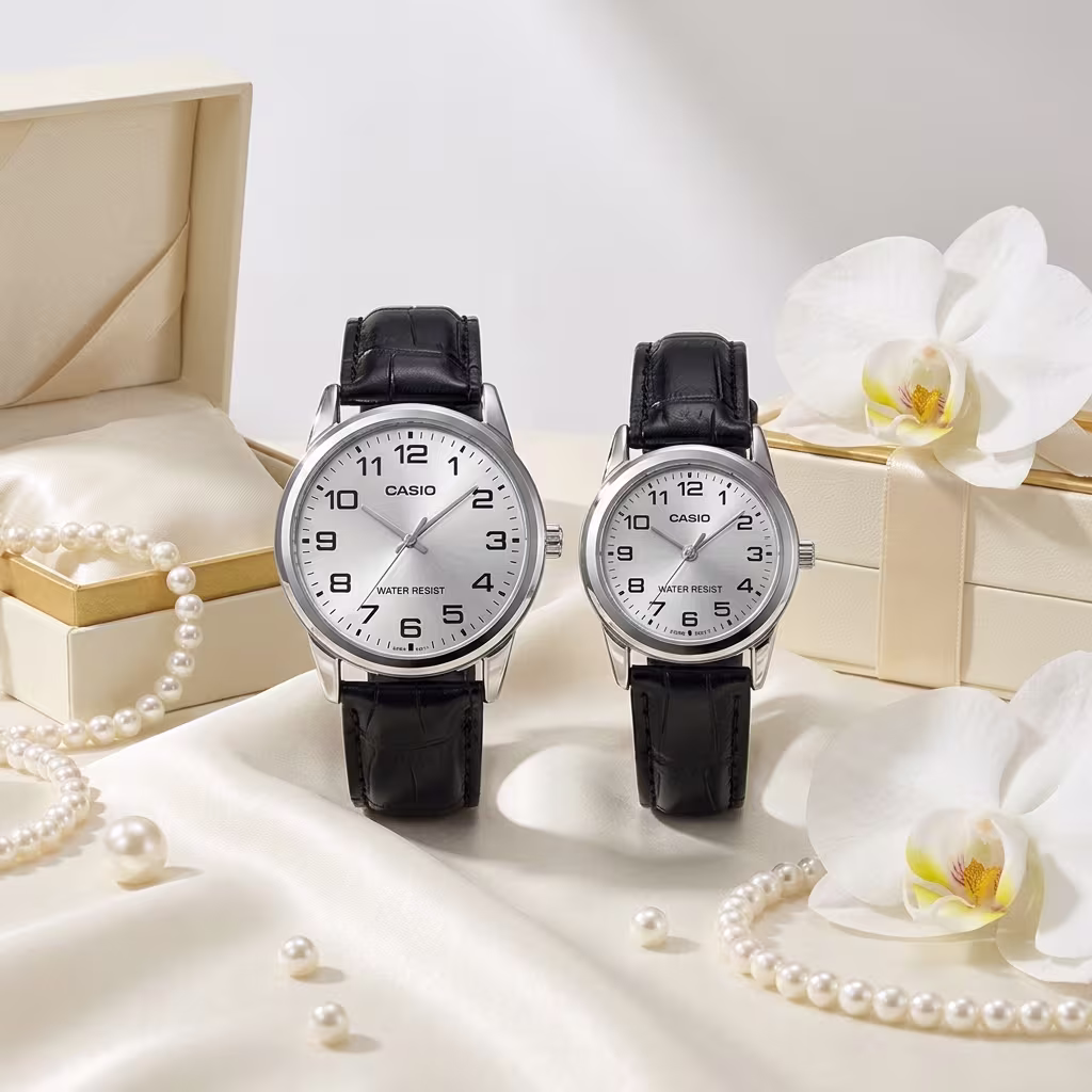Casio couple watches with silver numeric dials and black leather straps