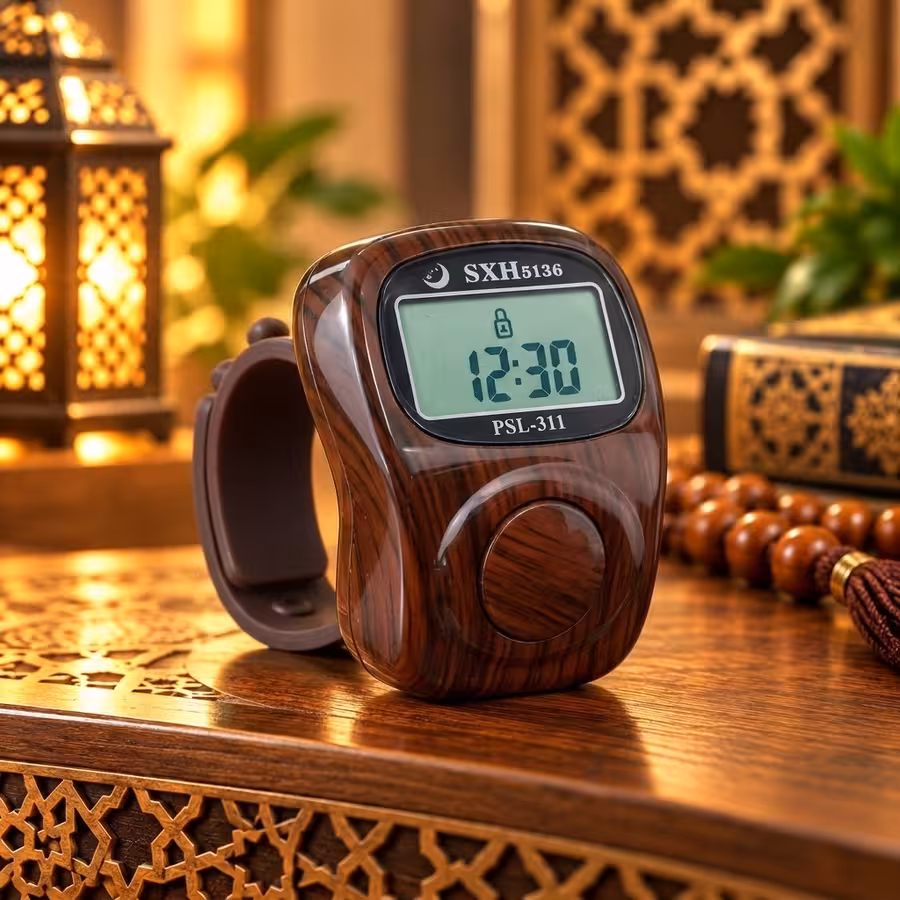 Dark brown wood-grain digital Tasbeeh counter with 8 Dhikr channels, LCD clock and finger-worn design.