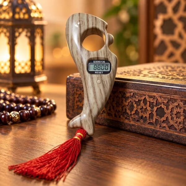 Light grey wood-grain fish-shaped digital Tasbeeh counter with LCD screen and red tassel