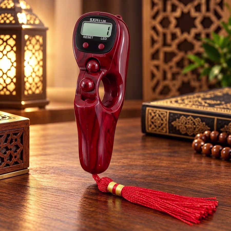 Burgundy red wood-grain digital Zikr counter with LCD screen, LED function and ergonomic finger grip.