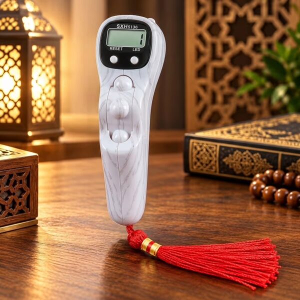 White wood-grain LED Digital Tasbeeh Counter with electronic LCD display, finger-grip design and red tassel.
