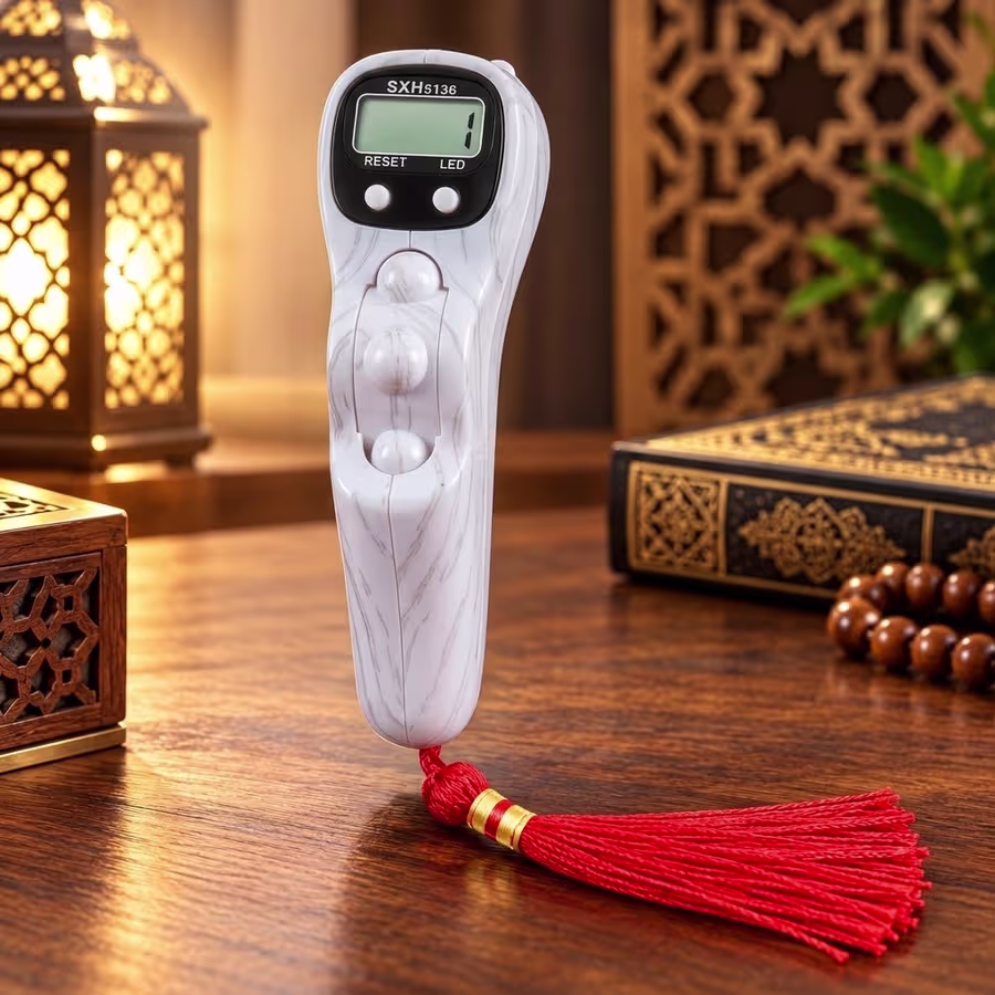 White wood-grain LED Digital Tasbeeh Counter with electronic LCD display, finger-grip design and red tassel.